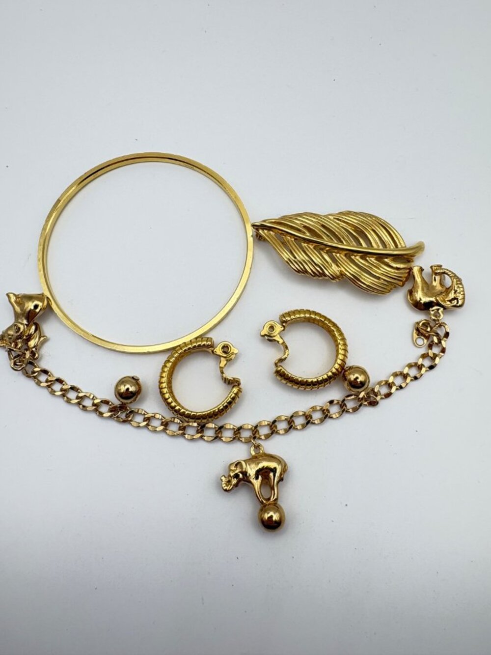 Vintage Designer Gold Tone Jewelry Lot Trifari Bangle Monet Earrings Avon Napier